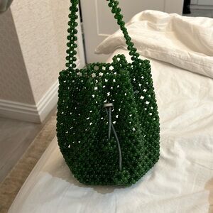 Green beaded bucket bag